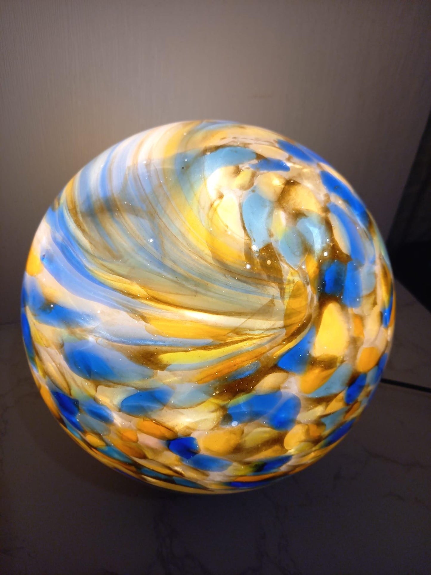 Handcrafted Golden Swirl Glass Sphere Lamp: Artisan Ambient Light