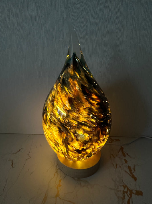 Handmade glass USB lamp in a colorful tear drop design a unique piece of art that fills your space with warmth and magical reflections