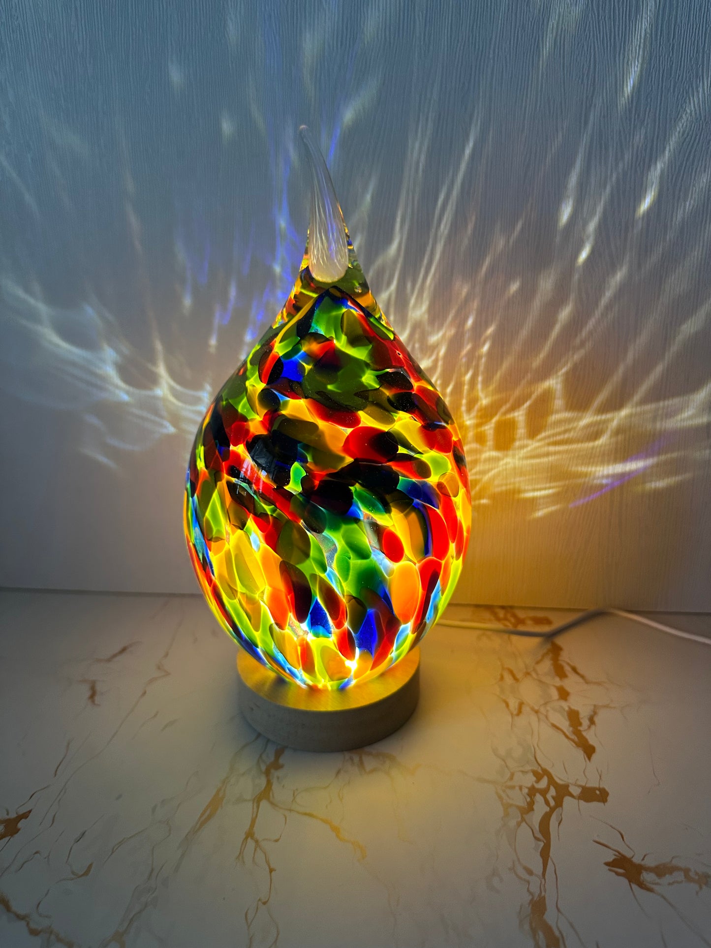 Handmade glass USB lamp in a colorful tear drop design a unique piece of art that fills your space with warmth and magical reflections