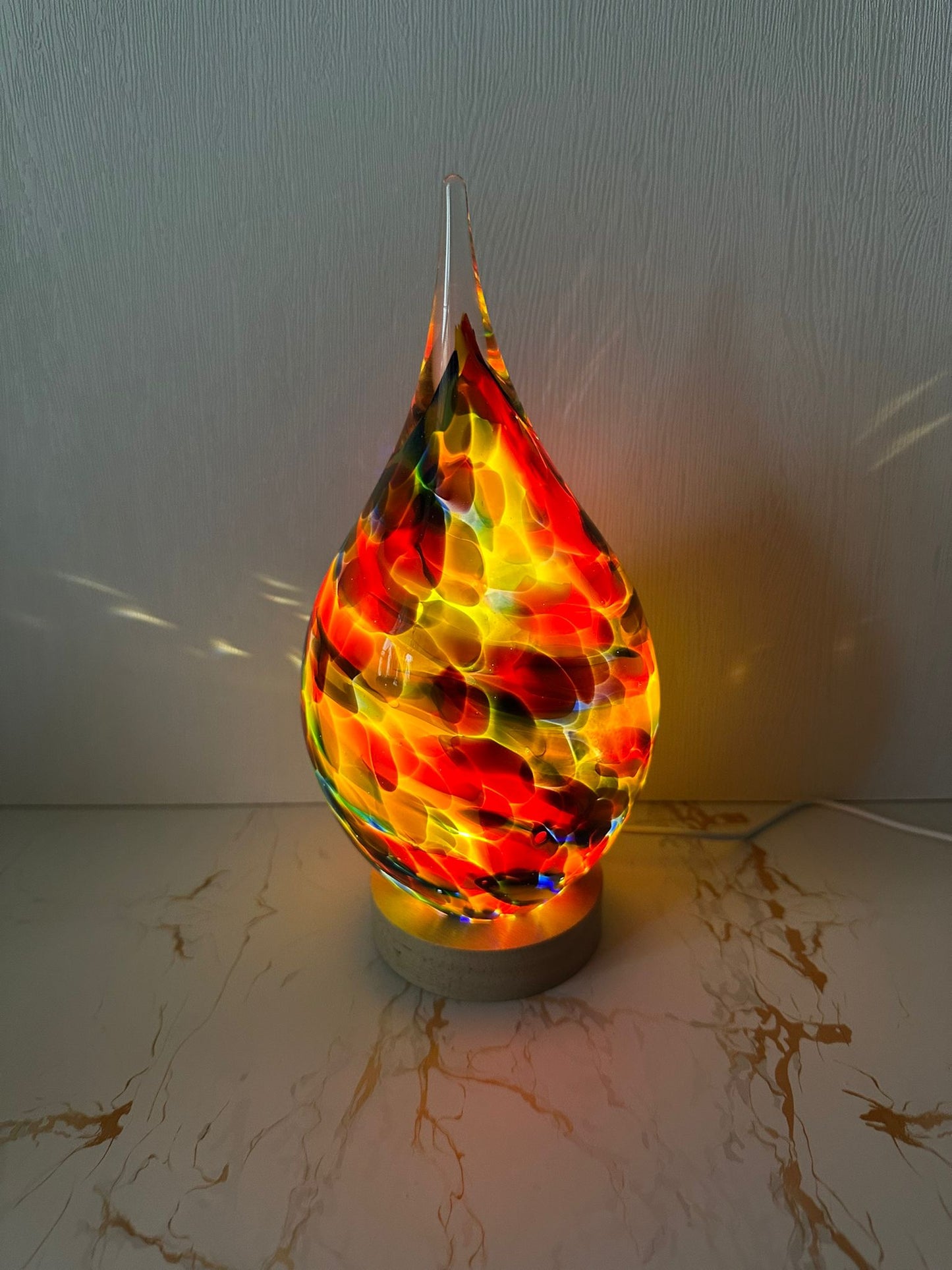 Handmade glass USB lamp in a colorful tear drop design a unique piece of art that fills your space with warmth and magical reflections