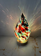 Handmade glass USB lamp in a colorful tear drop design a unique piece of art that fills your space with warmth and magical reflections